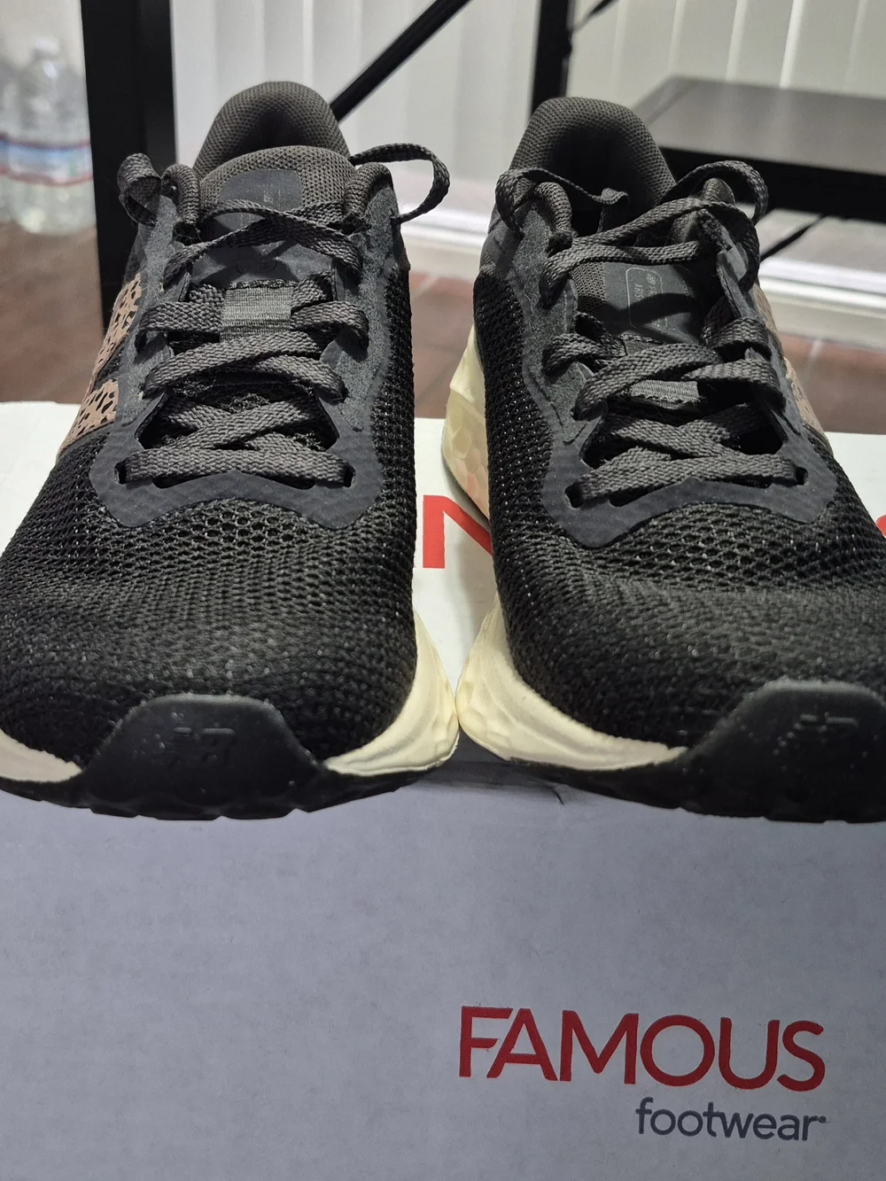 New Balance Women's Black Running Sneakers with Leopard Accent